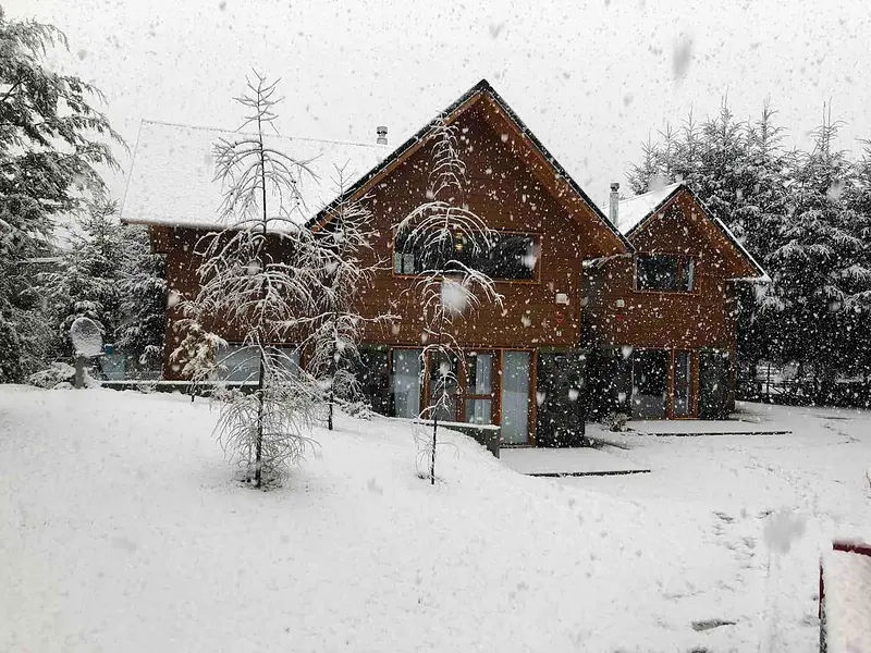 A cabin in the snowfall