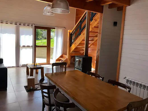 Living-dining room with wood-burning stove